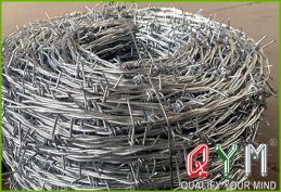 Blade barbed wire fence